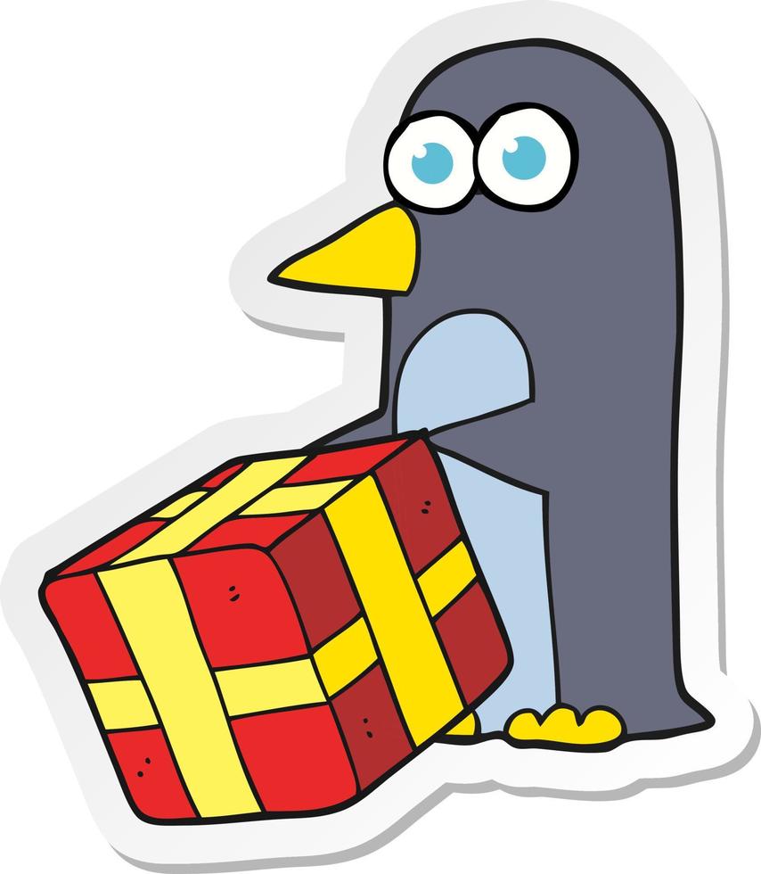 adesivo de um pinguim de desenho animado com presente de natal vetor