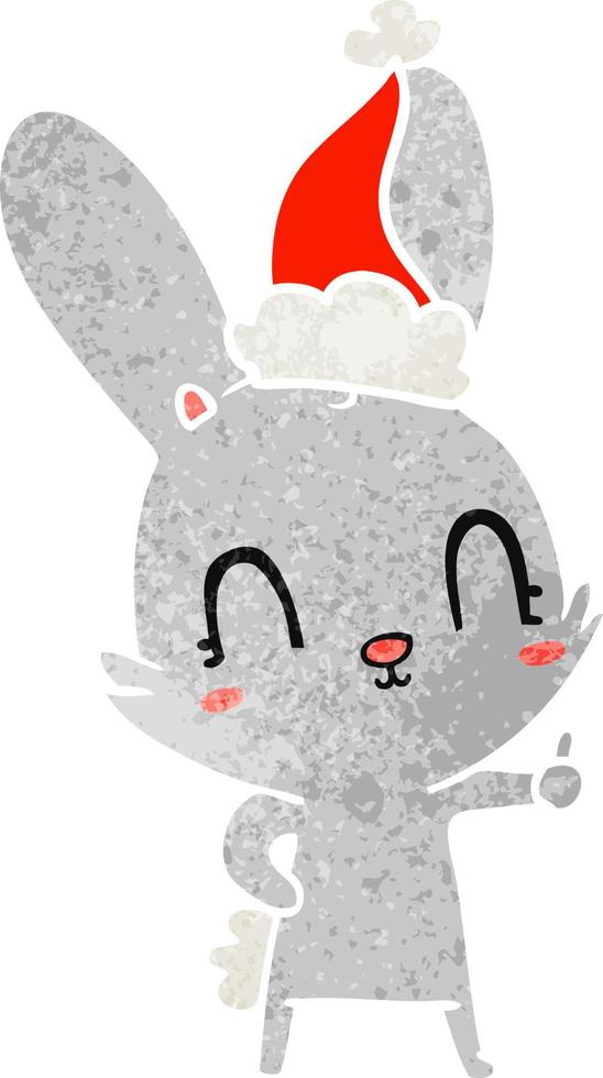 bonito desenho retrô de um coelho usando chapéu de papai noel vetor