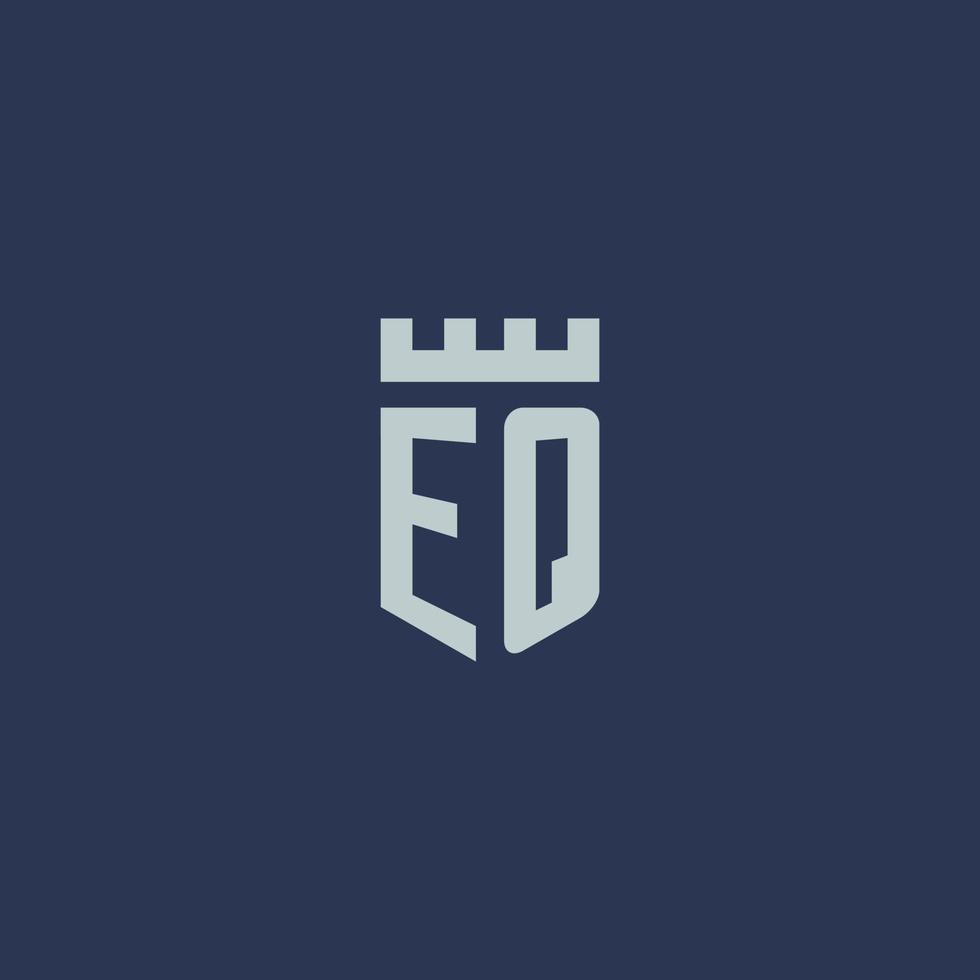 monograma do logotipo eq com castelo fortaleza e design de estilo escudo vetor