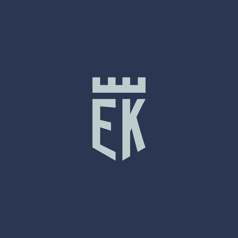 monograma de logotipo ek com castelo fortaleza e design de estilo escudo vetor