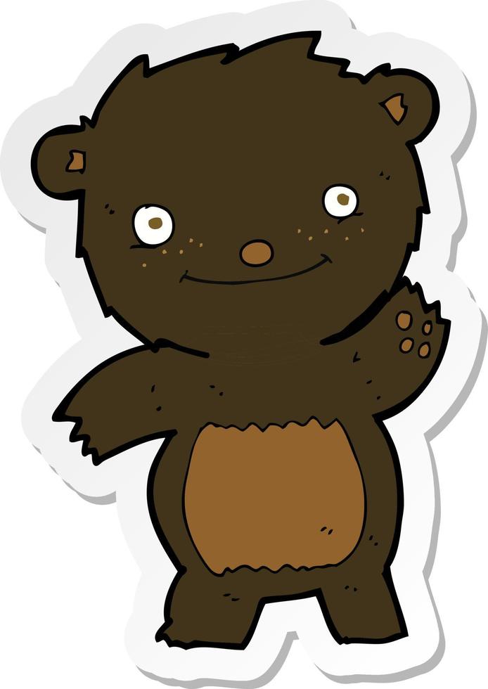 adesivo de um desenho animado acenando o filhote de urso preto vetor