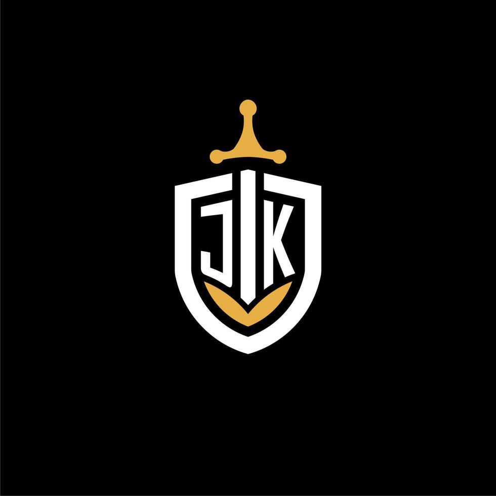 carta criativa jk logo gaming esport com ideias de design de escudo e espada vetor