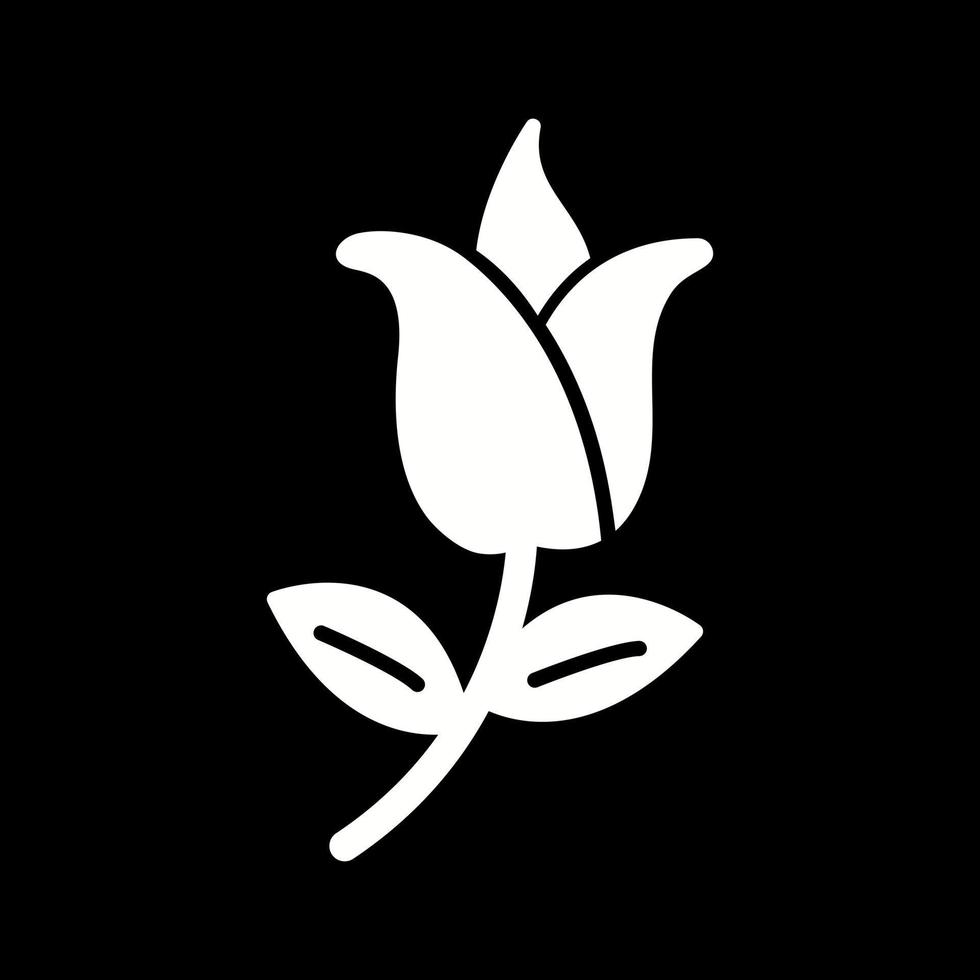 flor com ícone de vetor de folhas
