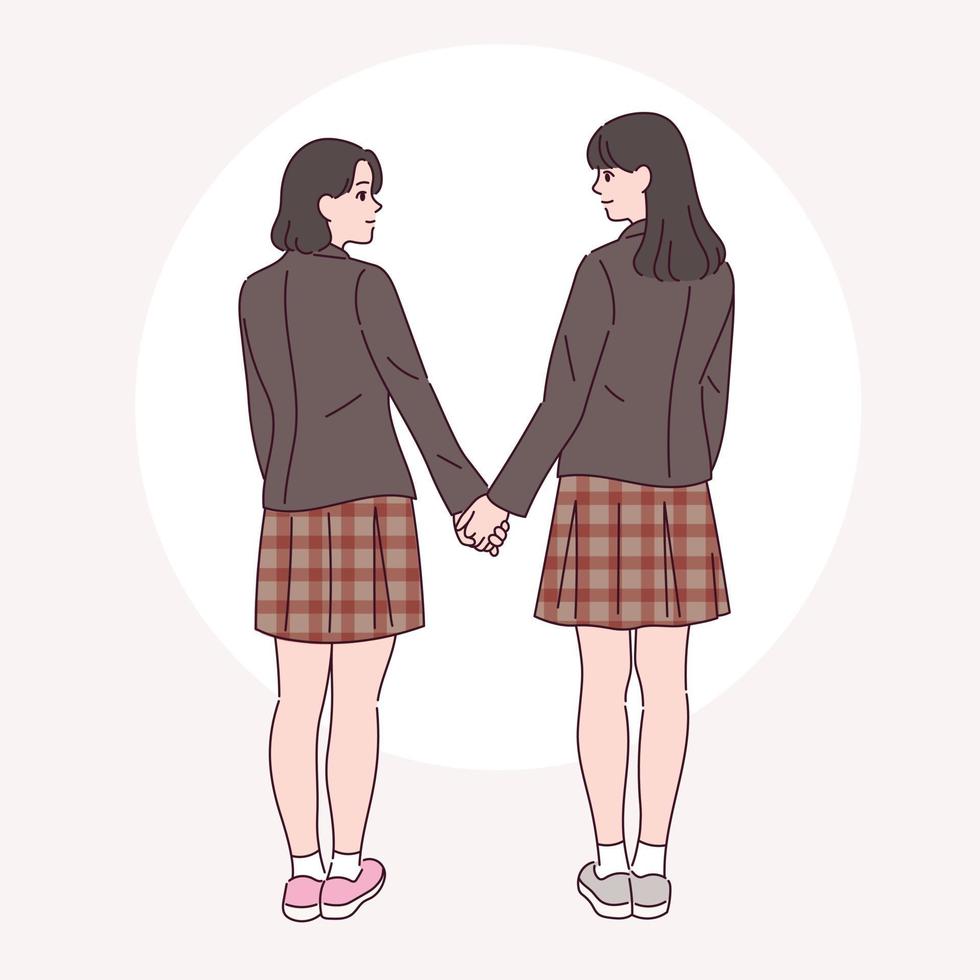 vista traseira de duas meninas em uniformes escolares, segurando as mãos uma da outra. vetor