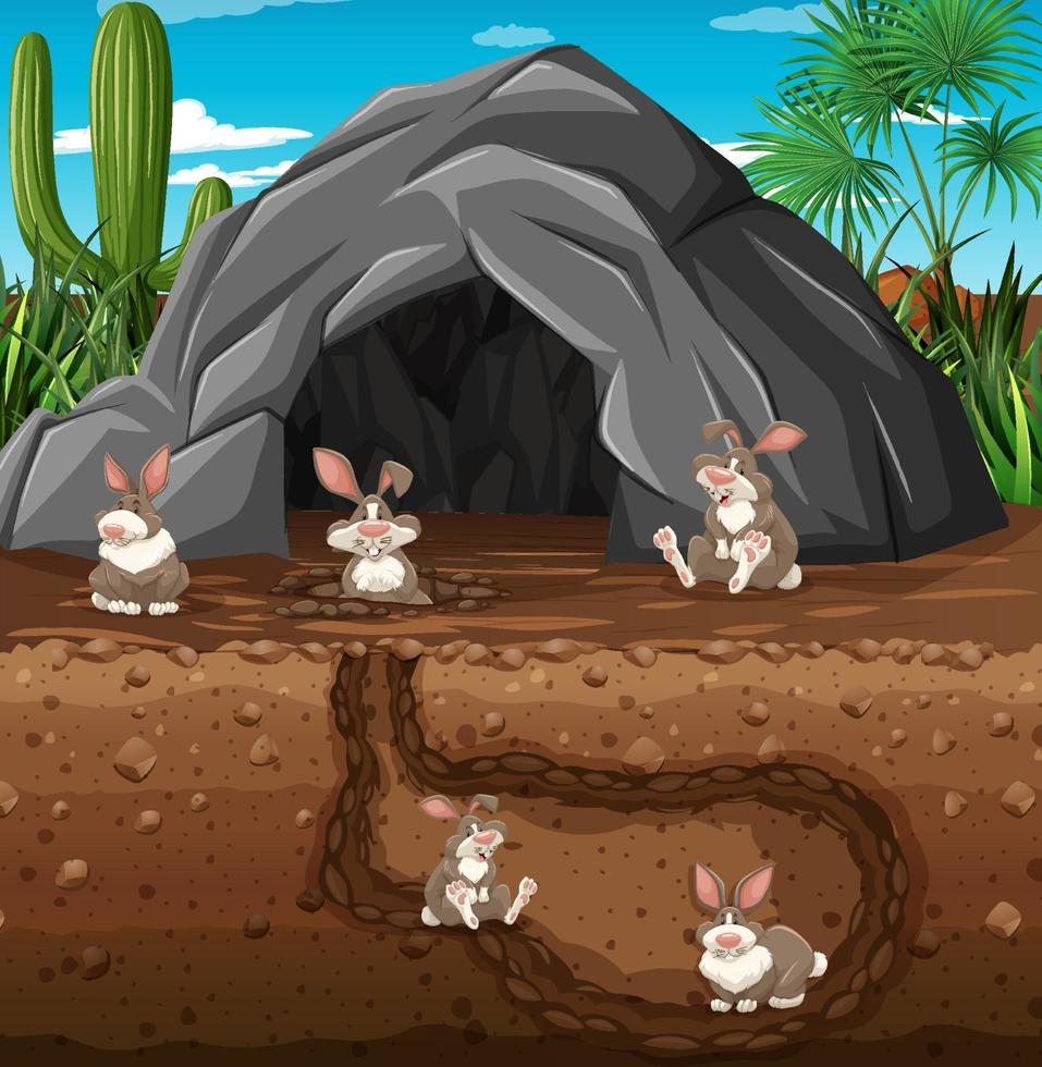 Toca de animais subterrânea com família de coelhos vetor