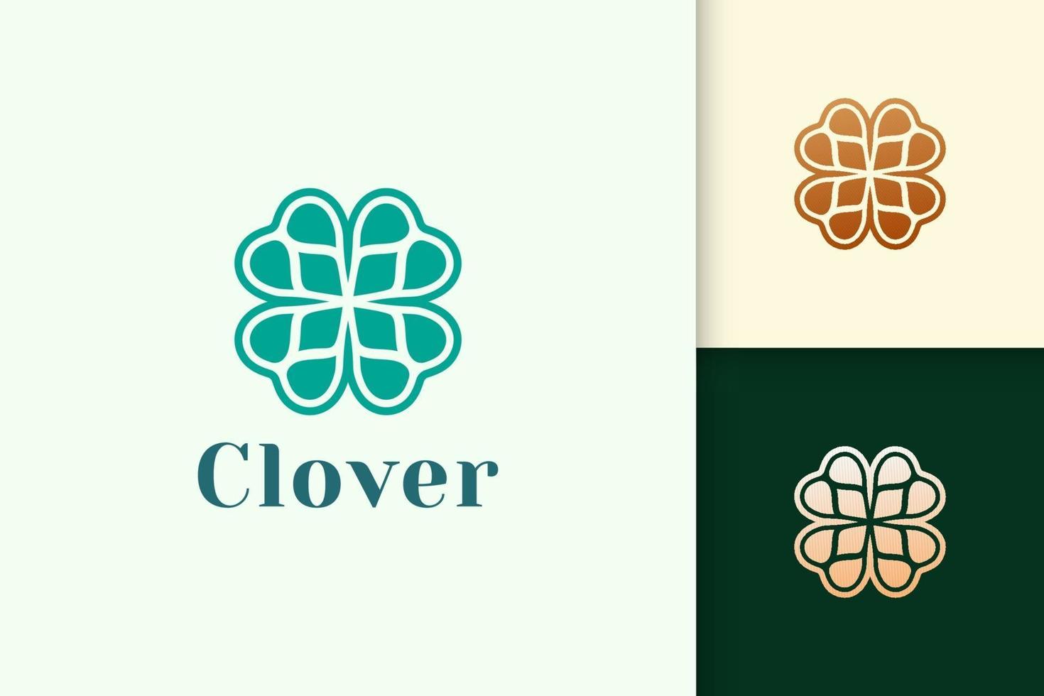 o logotipo da folha de trevo em abstrato com a cor verde representa sorte ou erva vetor