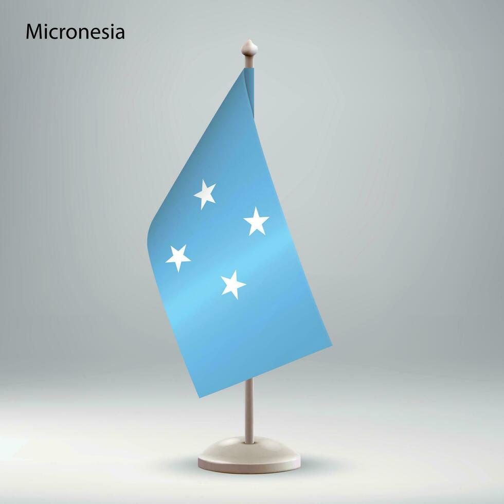 bandeira do Micronésia suspensão em uma bandeira ficar em pé. vetor