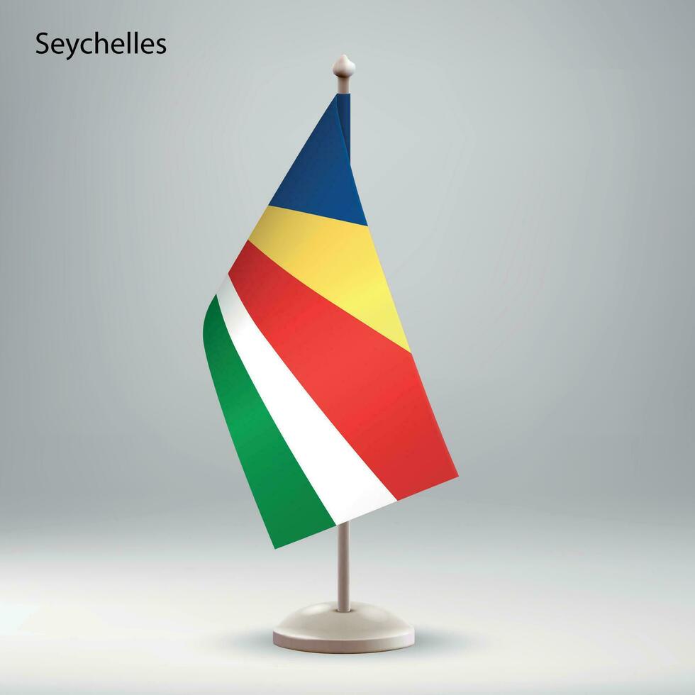 bandeira do seychelles suspensão em uma bandeira ficar em pé. vetor