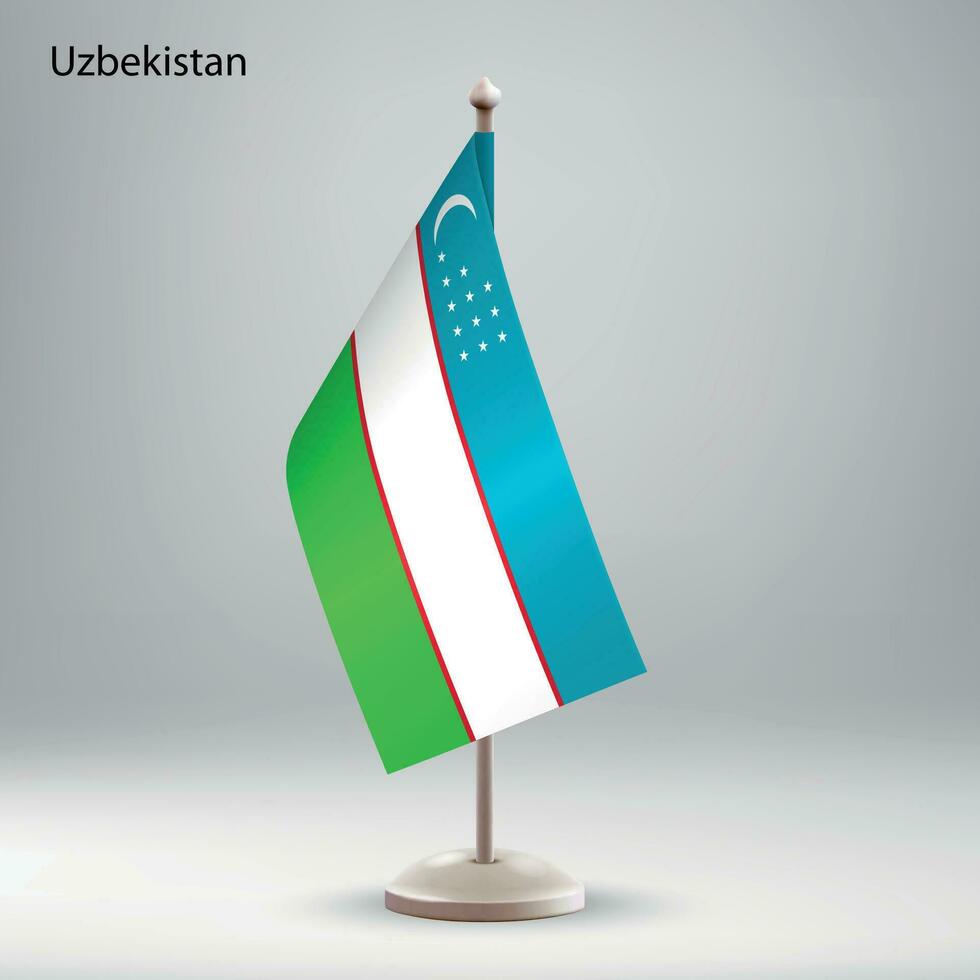 bandeira do uzbequistão suspensão em uma bandeira ficar em pé. vetor