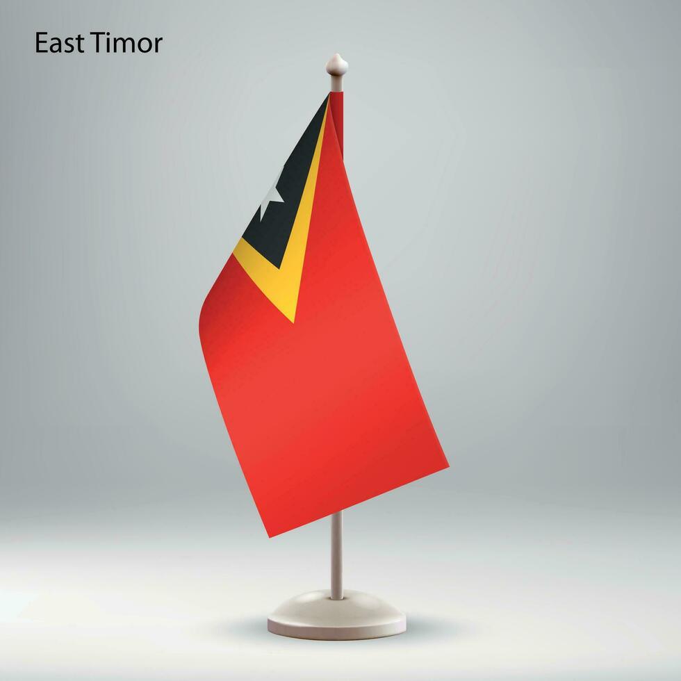 bandeira do leste timor suspensão em uma bandeira ficar em pé. vetor