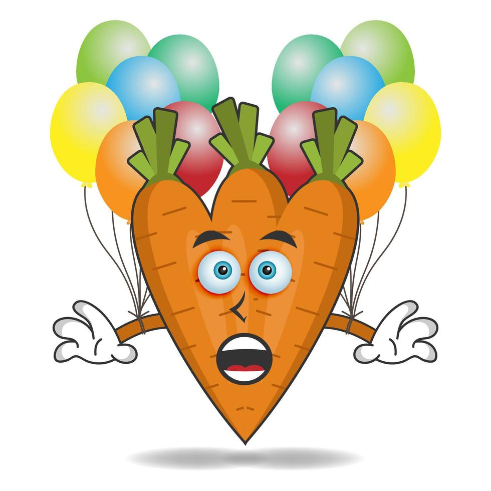 personagem do mascote da cenoura segurando um balão. ilustração vetorial vetor