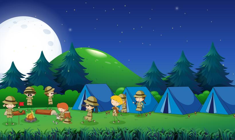 Crianças acampadas na floresta vetor