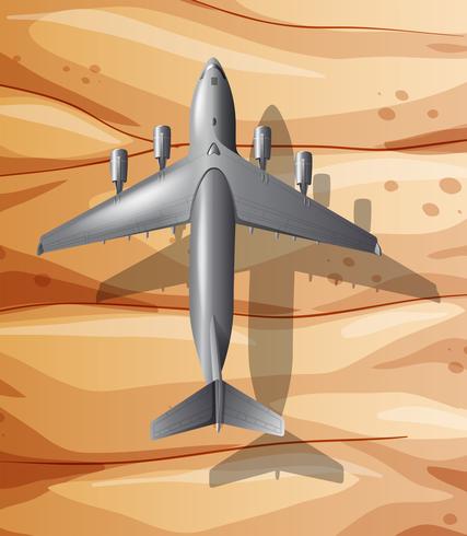 Um avião sobrevoando o deserto vetor
