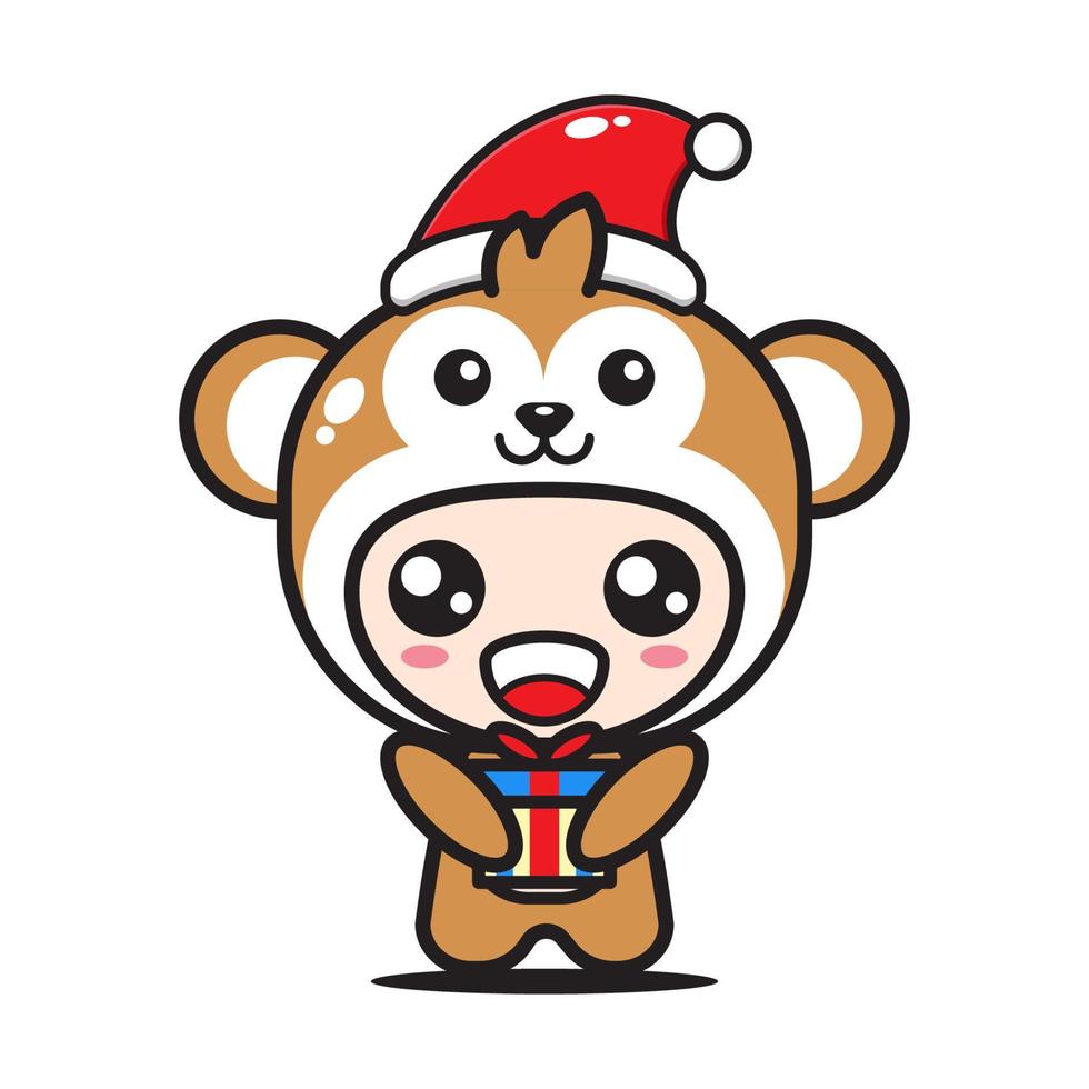 macaco bonito dos desenhos animados com presente de natal vetor