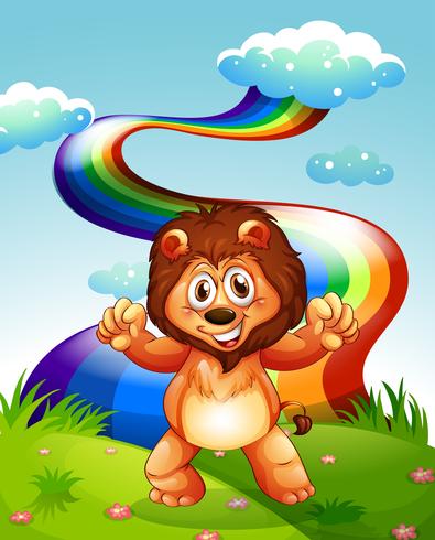 Um leão feliz no topo da colina com um arco-íris no céu vetor