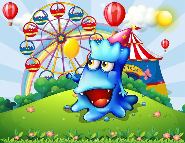 Um monstro azul feliz no topo da colina com um carnaval vetor