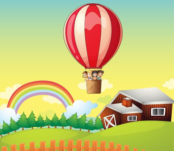 Crianças em um balão de ar e uma casa vetor