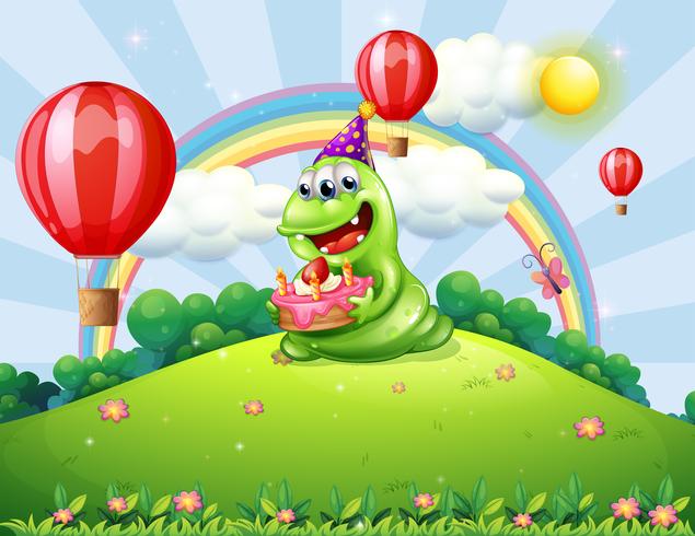 Um monstro verde feliz comemorando seu aniversário no topo da colina vetor