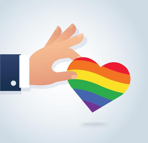mão segurando o vetor de coração de bandeira de arco-íris. O amor é amor, o amor vence