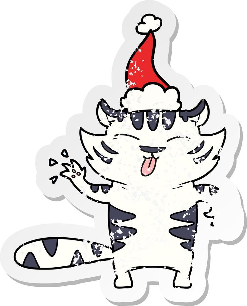 desenho de adesivo angustiado de um tigre branco usando chapéu de papai noel vetor