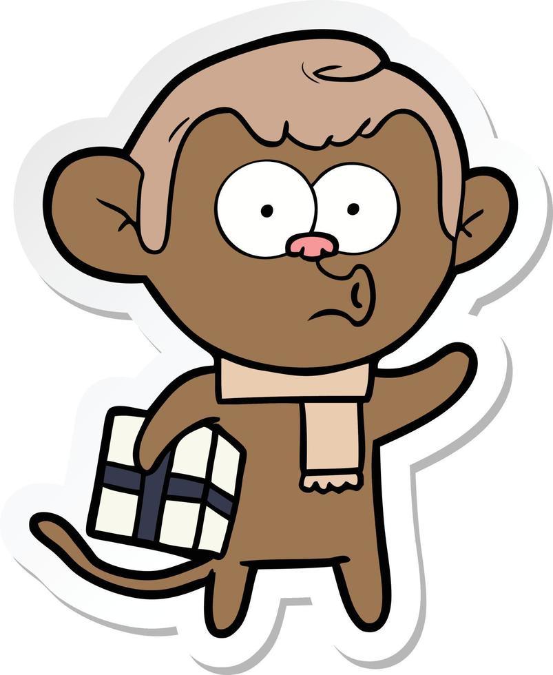 adesivo de um macaco de natal de desenho animado vetor