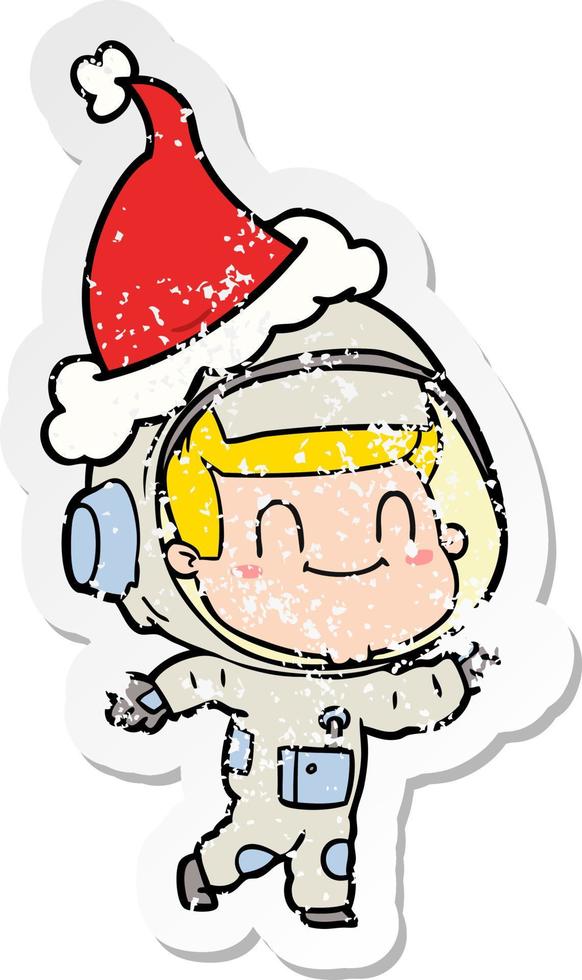 feliz desenho de adesivo angustiado de um homem astronauta usando chapéu de papai noel vetor