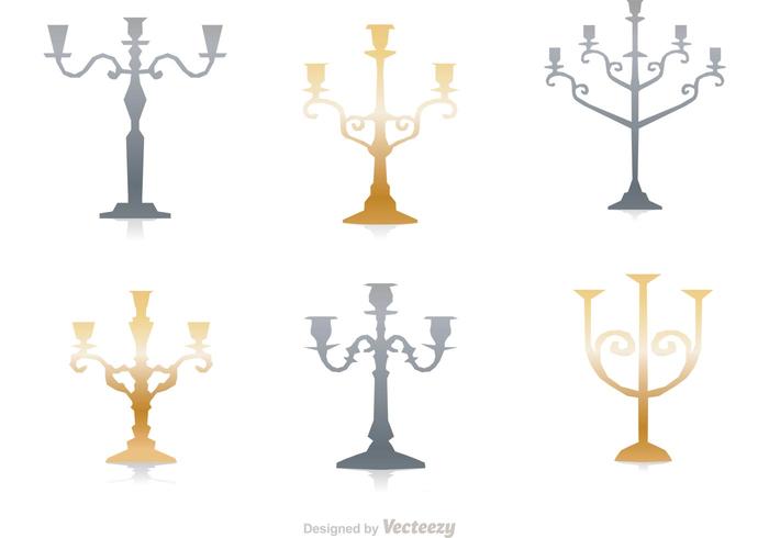 Silver and Gold Candlesticks Vector