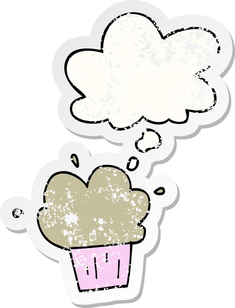 cupcake de desenho animado e balão de pensamento como um adesivo desgastado vetor