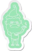 adesivo de desenho animado de um homem desdenhoso com barba franzindo a testa usando chapéu de papai noel vetor
