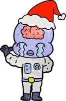 desenho texturizado de um alienígena de cérebro grande chorando usando chapéu de papai noel vetor