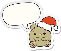 urso de natal bonito dos desenhos animados e adesivo de bolha de fala vetor
