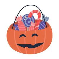 cesta de abóbora de halloween cheia de doces e guloseimas vetor