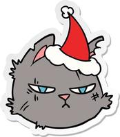 desenho de adesivo de uma cara de gato duro usando chapéu de papai noel vetor