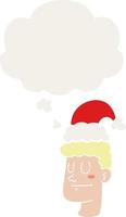 homem de desenho animado usando chapéu de natal e balão de pensamento em estilo retrô vetor