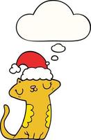 gato bonito dos desenhos animados usando chapéu de natal e balão de pensamento vetor