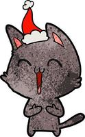 feliz desenho texturizado de um gato usando chapéu de papai noel vetor