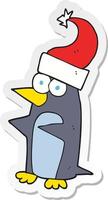 adesivo de um pinguim de natal de desenho animado vetor