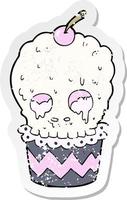 adesivo retrô angustiado de um desenho de cupcake de caveira assustador vetor