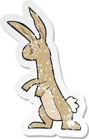 adesivo retrô angustiado de um coelho de desenho animado vetor