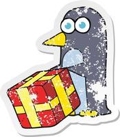 adesivo retrô angustiado de um pinguim de desenho animado com presente de natal vetor