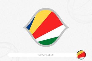 bandeira de seychelles para competição de basquete em fundo cinza de basquete. vetor