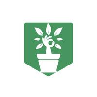 design de logotipo de vetor de jardim ecológico. árvore de mão com design de ícone de vaso de flores.