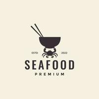 design de logotipo de tigela de comida de caranguejo de frutos do mar vetor