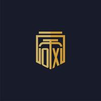 ox logotipo inicial do monograma elegante com design de estilo escudo para mural de parede jogos de escritório de advocacia vetor