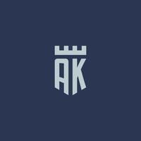 ak logotipo monograma com castelo fortaleza e design de estilo escudo vetor