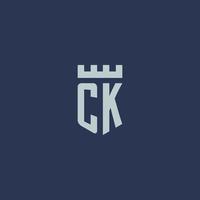 ck logotipo monograma com castelo fortaleza e design de estilo escudo vetor