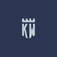 kw logotipo monograma com castelo fortaleza e design de estilo escudo vetor
