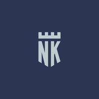 nk logotipo monograma com castelo fortaleza e design de estilo escudo vetor
