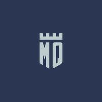 monograma de logotipo mq com castelo fortaleza e design de estilo escudo vetor