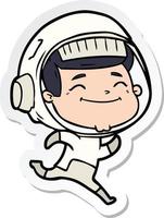 adesivo de um astronauta de desenho animado feliz vetor